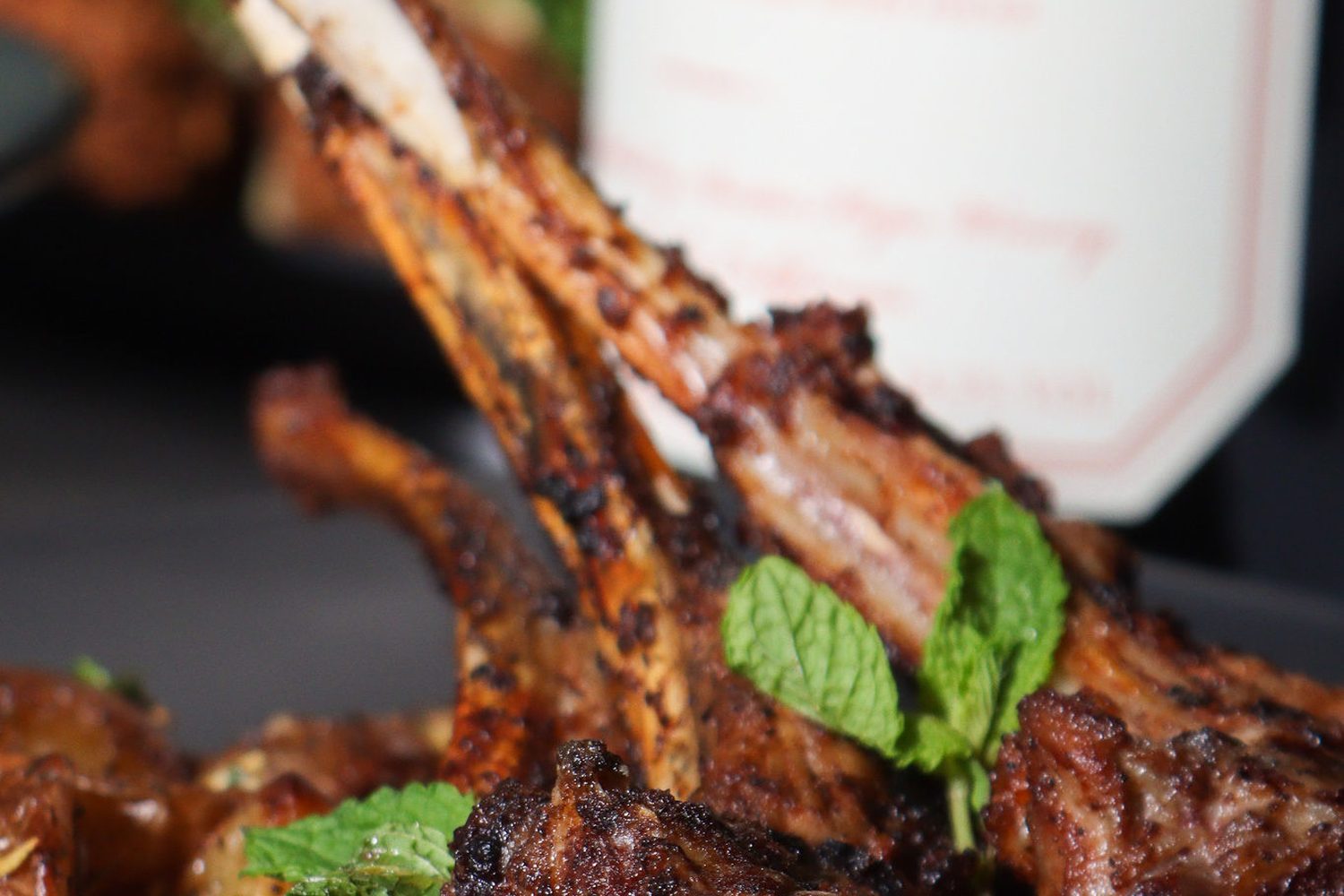 Lamb chops plated for dinner at Fusion