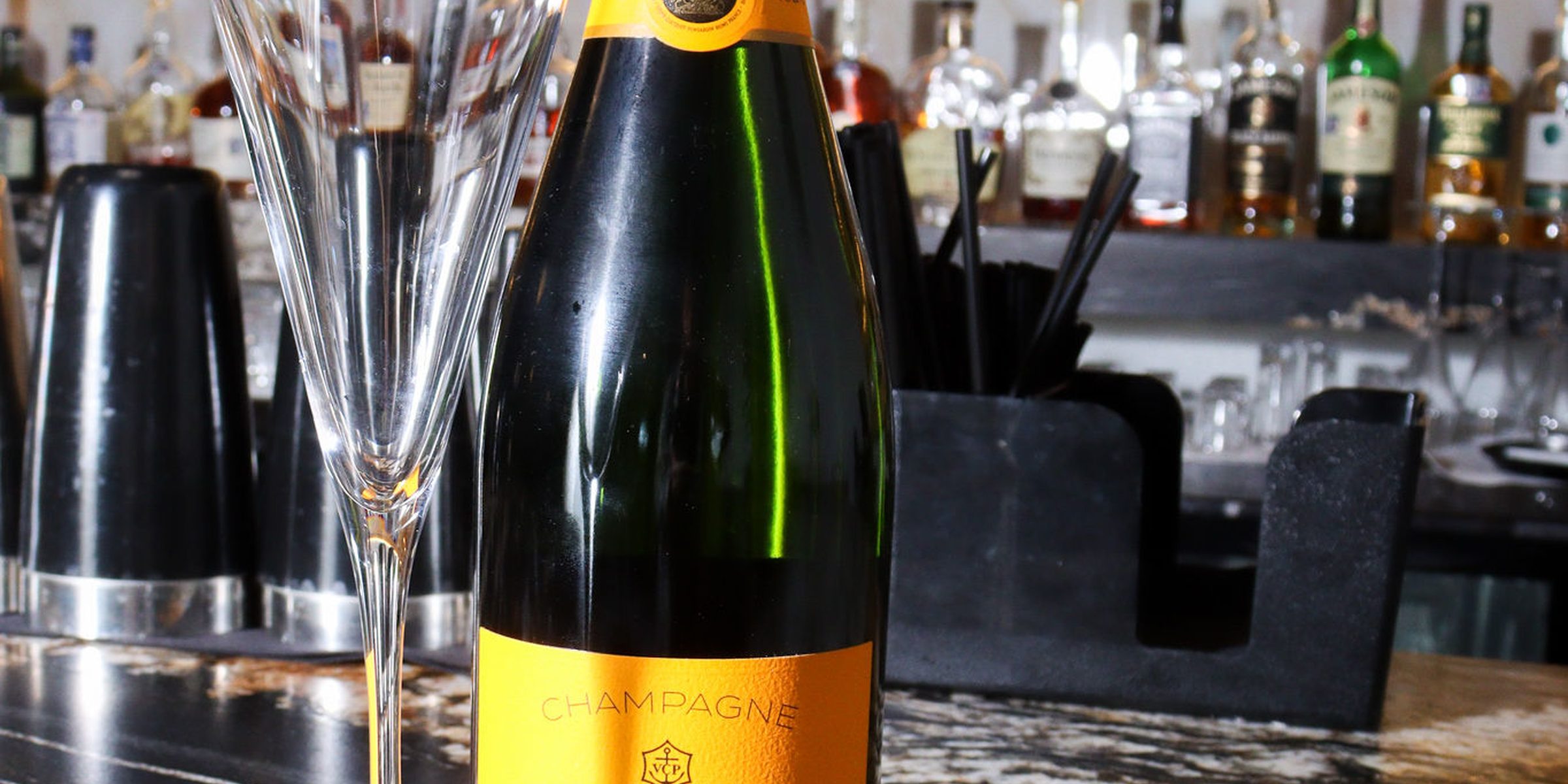 Champagne poured at the bar